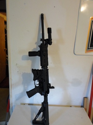 It has a gunfighters L3 charging handle. and the Magpul B.A.D lever.