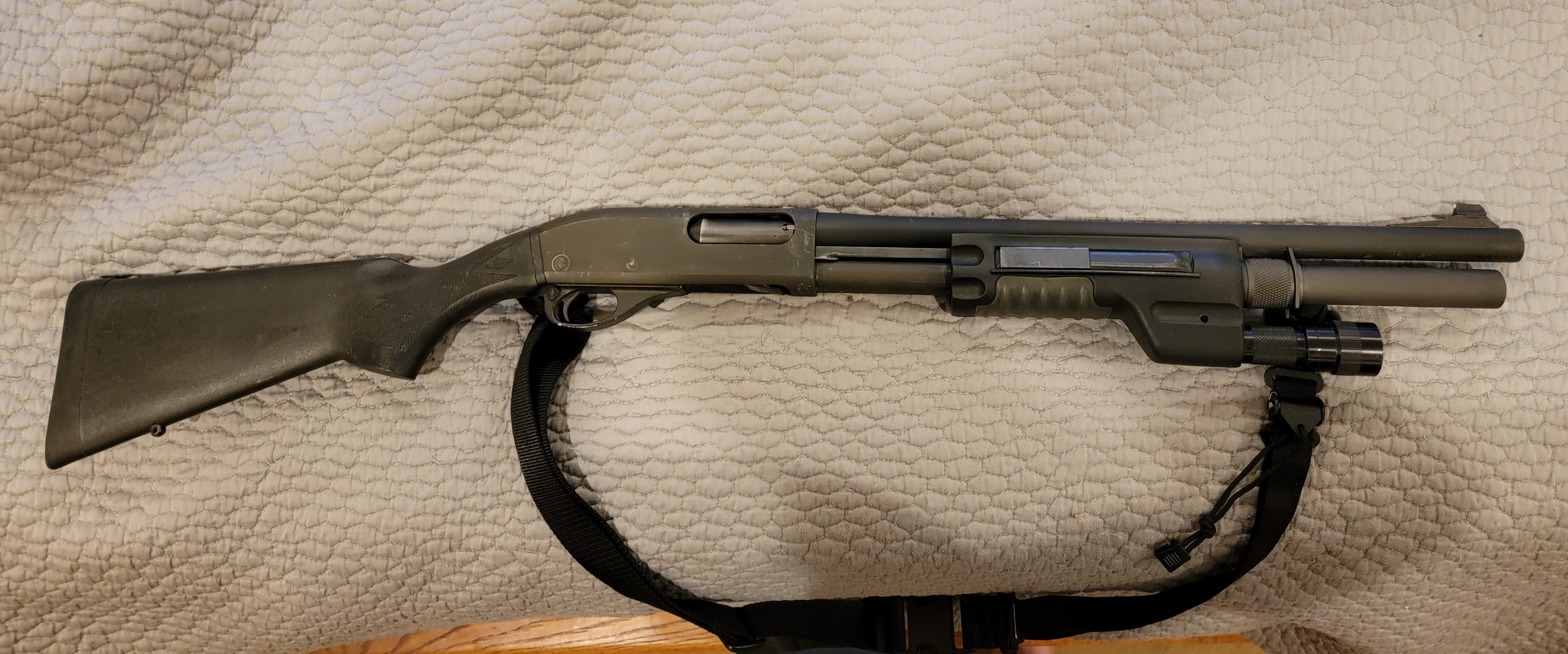 Newly added Wilson +2 mag extention.  Added during a REALLY boring teleconference within 30 mins of receipt.  This is my twin 870P project, and this will go to my 18 year old son.  Wood furniture on it's way along with some trigger group pins.  When all together, we'll strip it down and ceracote.  If he wants.  I'm betting he won't let me touch it. He loves the &quot;character&quot;.  I'm the opposite.  I want &quot;brand new&quot; and tactical.