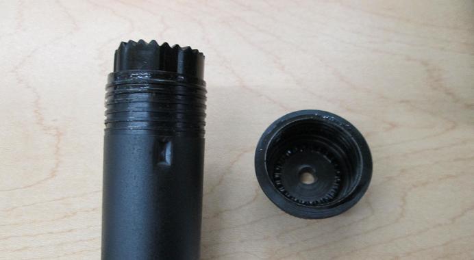 Synthetic retainer ratchet